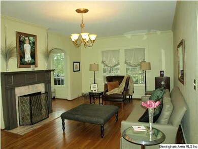 Marble fireplace with gas logs makes for cozy ambi