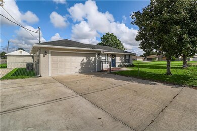 3000 Macon street view with a view of the workshop with electric and water connections and ample parking space.