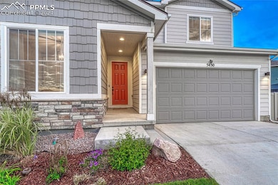 View of front door and entryway, highlighting some