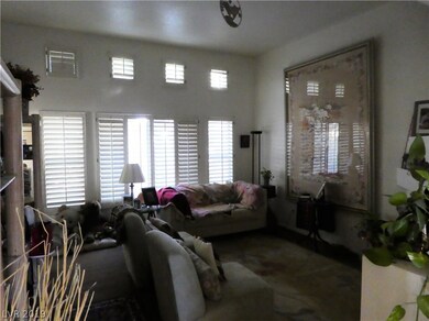 Formal living room w/shutters