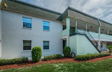 Hallway to unit #2 is behind staircase on ground f