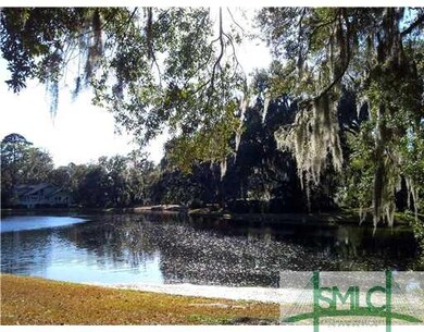 Land/Lot. View of lot from across the lagoon looki