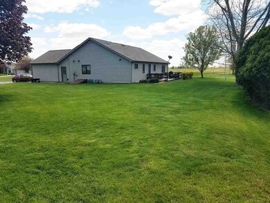 Large rear yard toward house.