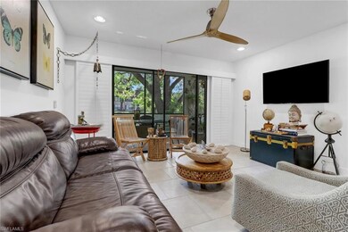 Living room with tiled floors, plantation shutters