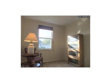 Bedroom 1 offers newer neutral carpet and walls an