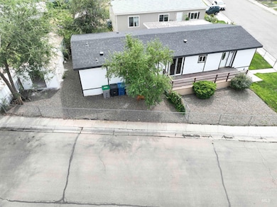 View of front of home featuring a shingled roof