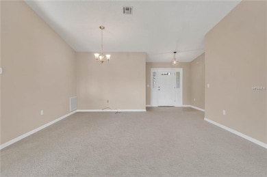 View from Living room into dining area and entryway