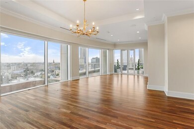 Palatial living area with wall to wall floor to ce