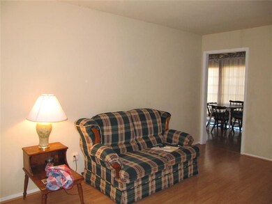 Another view of Living Room showing door into dini
