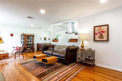 Living Room from front door. Tons of natural light