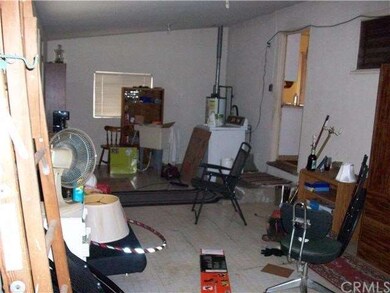 Room with access through kitchen