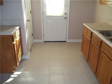 Kitchen with new counter tops, dishwasher & cerami