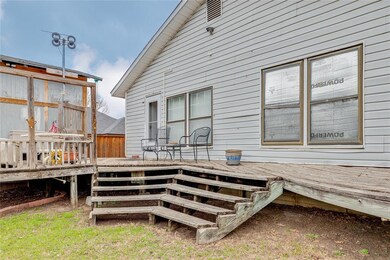 Backyard deck with steps to the yard.