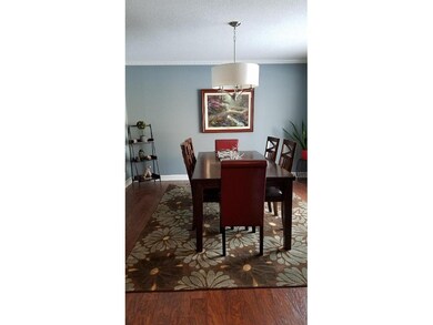 Spacious formal dining area with large picture win