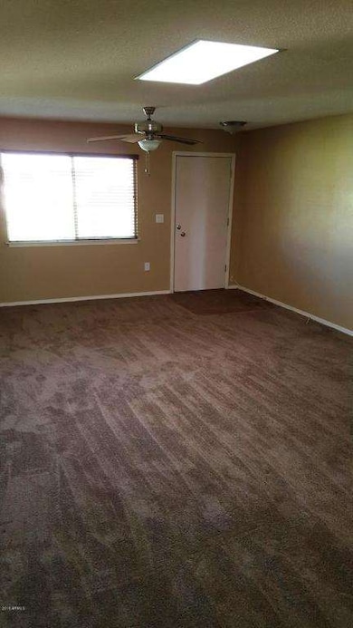 Living room w/skylight.