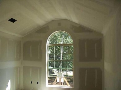 Living Room. Vaulted ceiling in living area