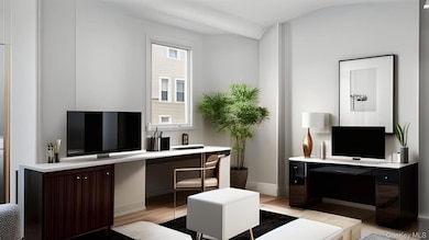 Office area with light wood-type flooring