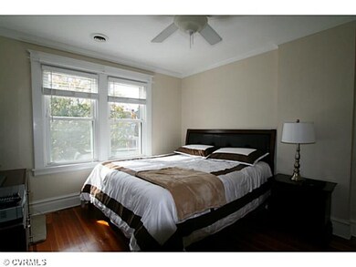 Master Bedroom - Wood floors, ceiing fan, tons of 