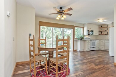 The dining nook is perfectly located between the kitchen and the living room.