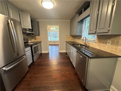 Kitchen featuring appliances with stainless steel 