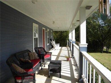 Front porch has room for all your friends to enjoy
