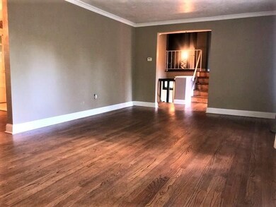 Living Room is HUGE! Wonderful Hard Woods!