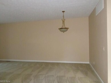 Dining room is in living room area