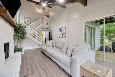 Step into a bright, open living area with vaulted