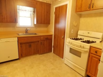 Kitchen with newer appliances.