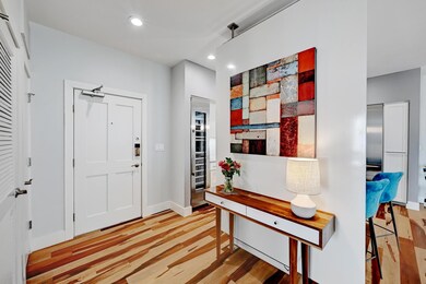 Entryway with baseboards, recessed lighting, and 