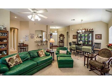 Living Room. Living area with ceiling fan, gas log