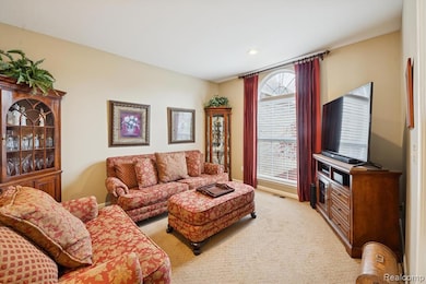 Front sitting room with floor to ceiling window.