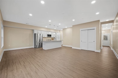 Another view of the open floor plan featuring a la