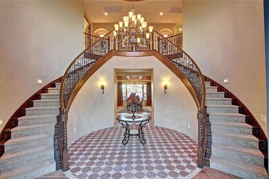 Magificent Curved Staircase Entry