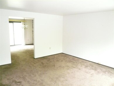 Living Room. Neutral carpeting, move in condition,