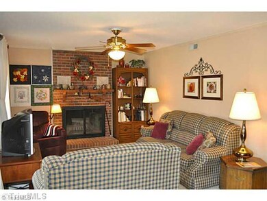 Living Room. Spacious living room enjoys a masonry wood burning fireplace.