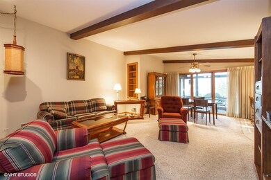 The family room with vaulted ceilings adjoins the 
