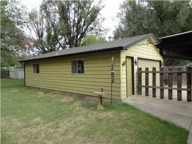 4-car tandem garage with a single car door on the 