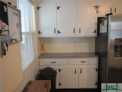kitchen with loads of cabinets