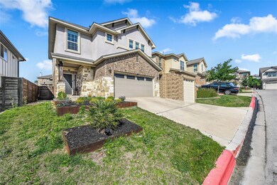 View of front of home featuring a garage, drivewa