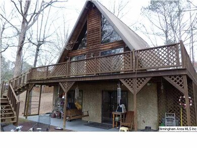 Closer view of lakefront side of home.