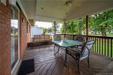 Covered deck to the rear of the home.    You will 