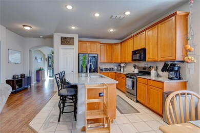 Beautiful kitchen with granite countertops.
