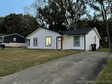 As you turn onto E Florida Street, the first home