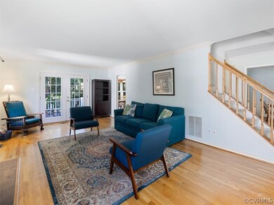 HW floors, fireplace, french doors to deck.