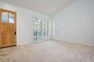 Spacious living room with high vaulted ceilings cr