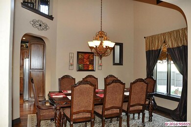 Two-Story Formal Dining Room with Juliet Balcony.