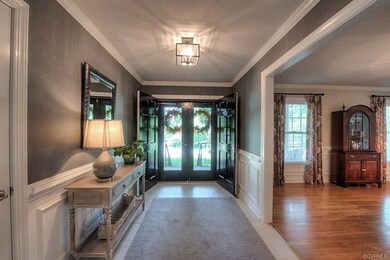 Foyer with double front door entry