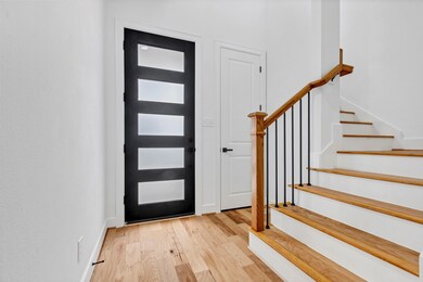 A view of the entry way facing back toward the fro