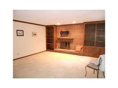 Family Room. Very large family room features a bui
